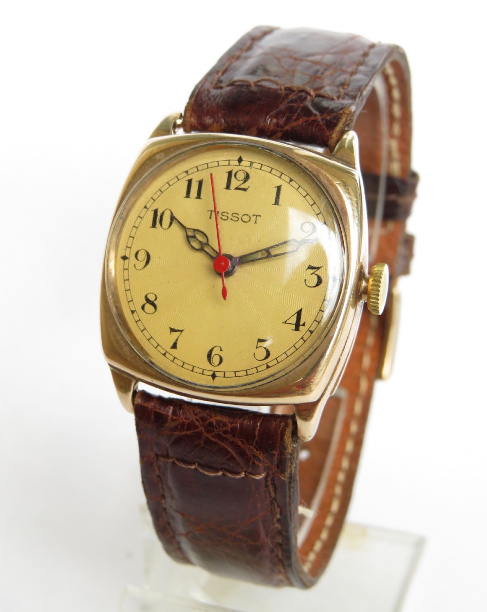 Mid-size 9ct gold cushion cased wrist watch, 1931