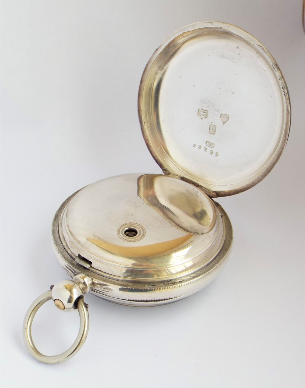 An antique 1879 silver Waltham pocket watch. View III