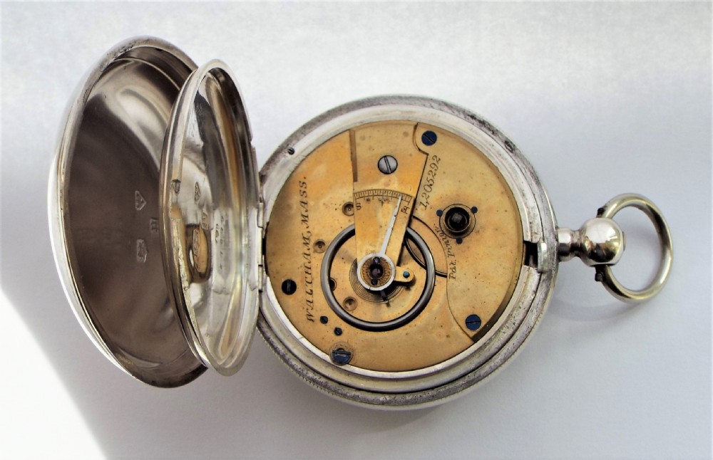 An antique 1879 silver Waltham pocket watch. View V