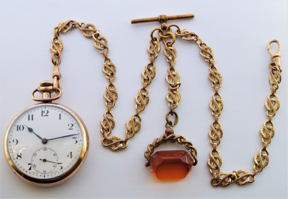 A 1920s stem winding pocket watch by Tavannes, with double albert. View III