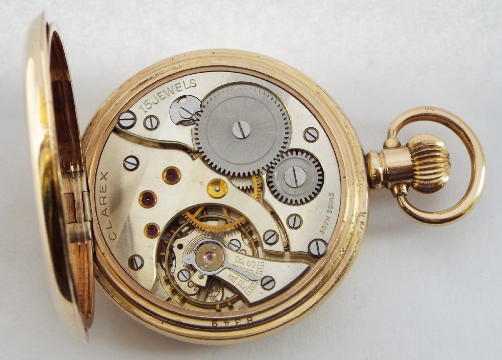 A 1940s Clarex stem winding pocket watch.  View V