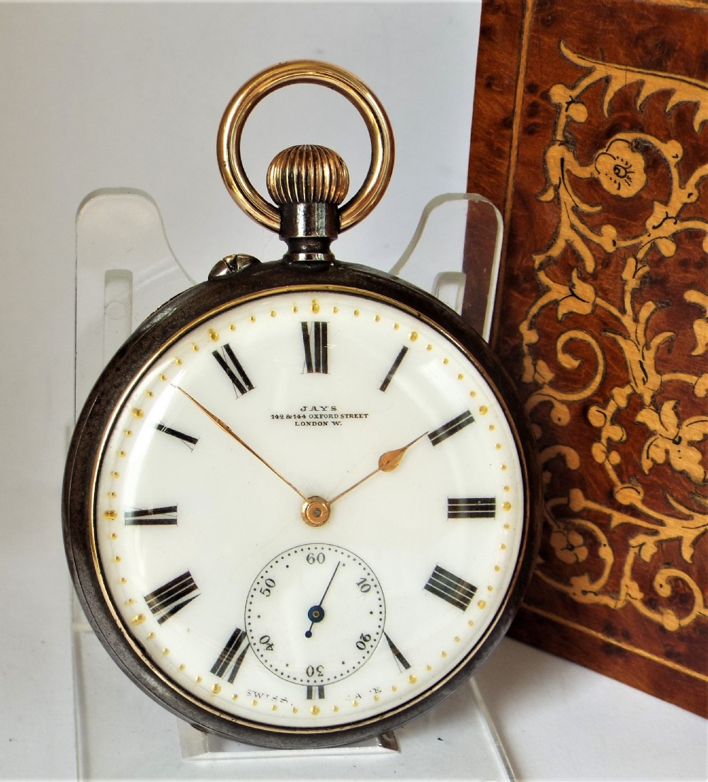 Antique Longines gun metal pocket watch retailed by Jays London.