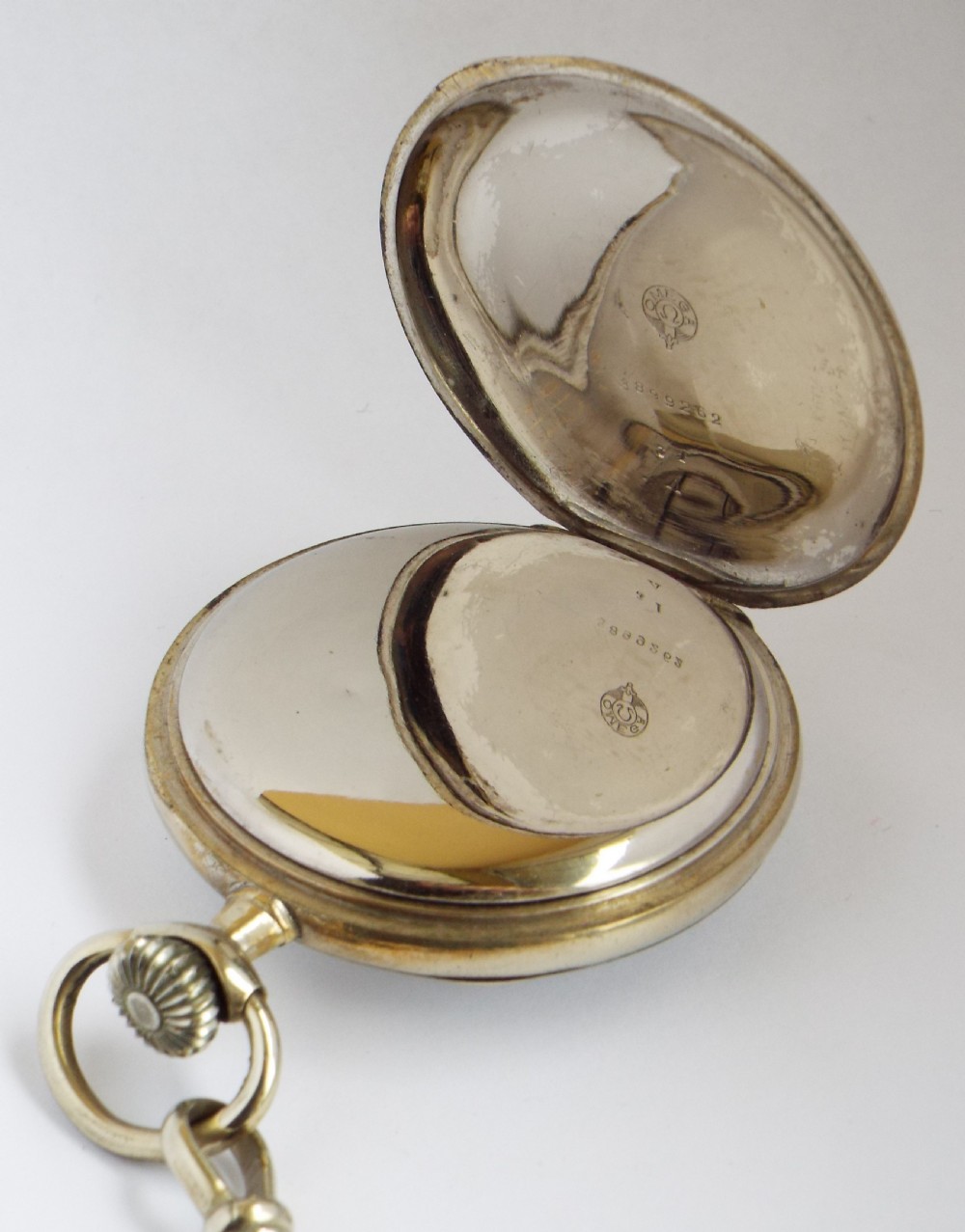 Antique Omega pocket watch and chain. View III