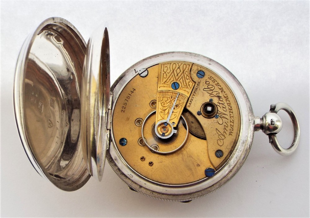 An antique 1919 silver Waltham pocket watch. View V