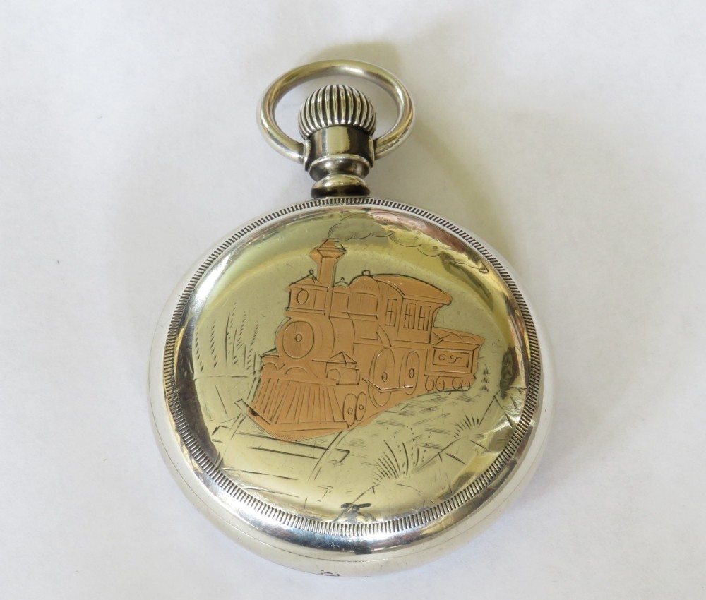 Antique silver Elgin steam locomotive pocket watch.