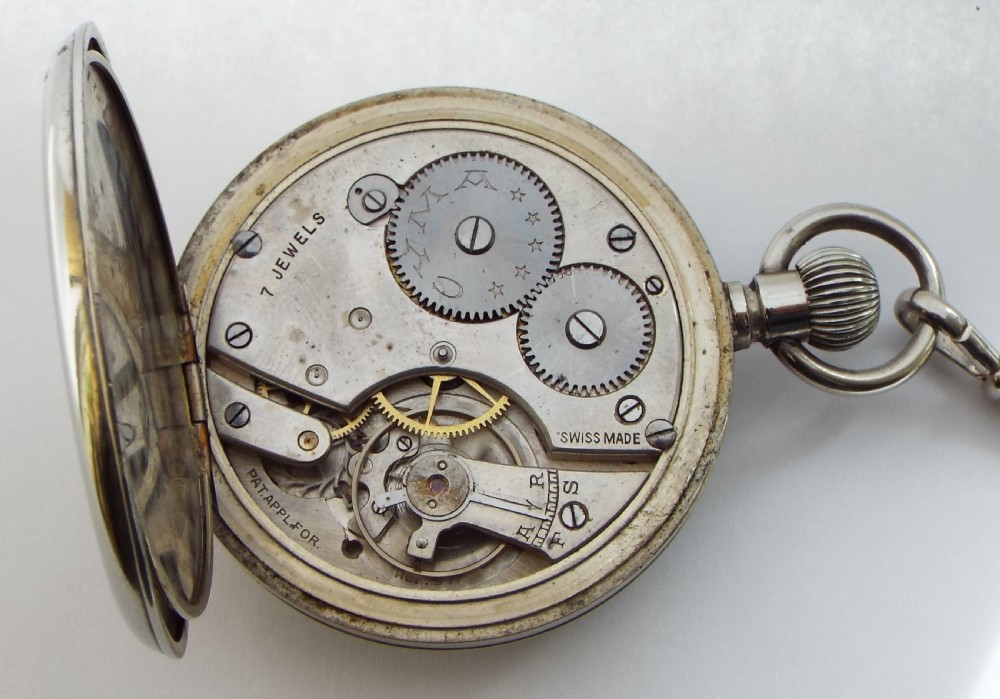 A 1920s Cyma pocket watch with chain. View V