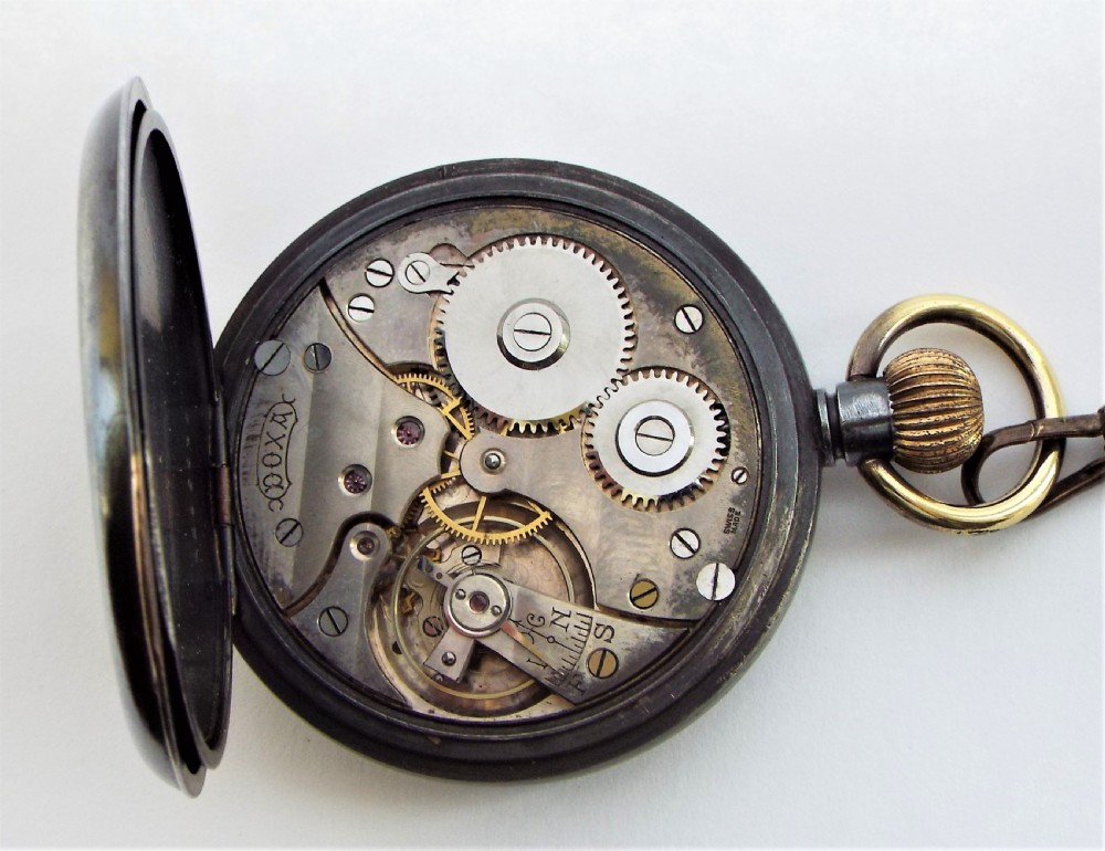 Antique gun metal Doxa pocket watch with chain. View V