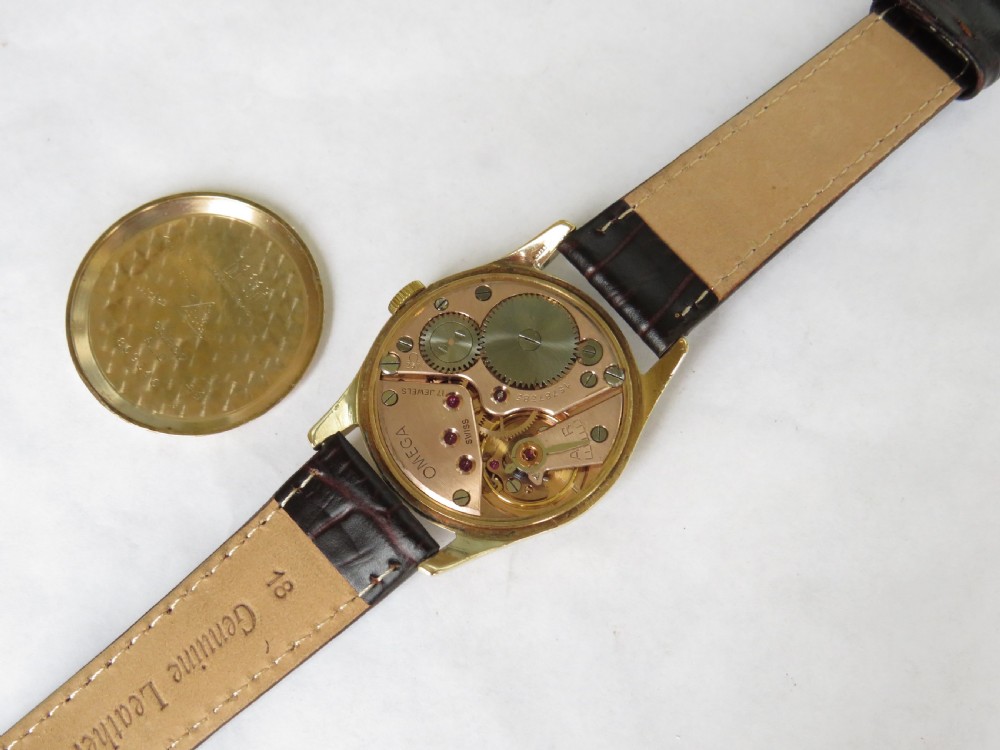 Gents 9ct gold Omega wrist watch, 1958 View V