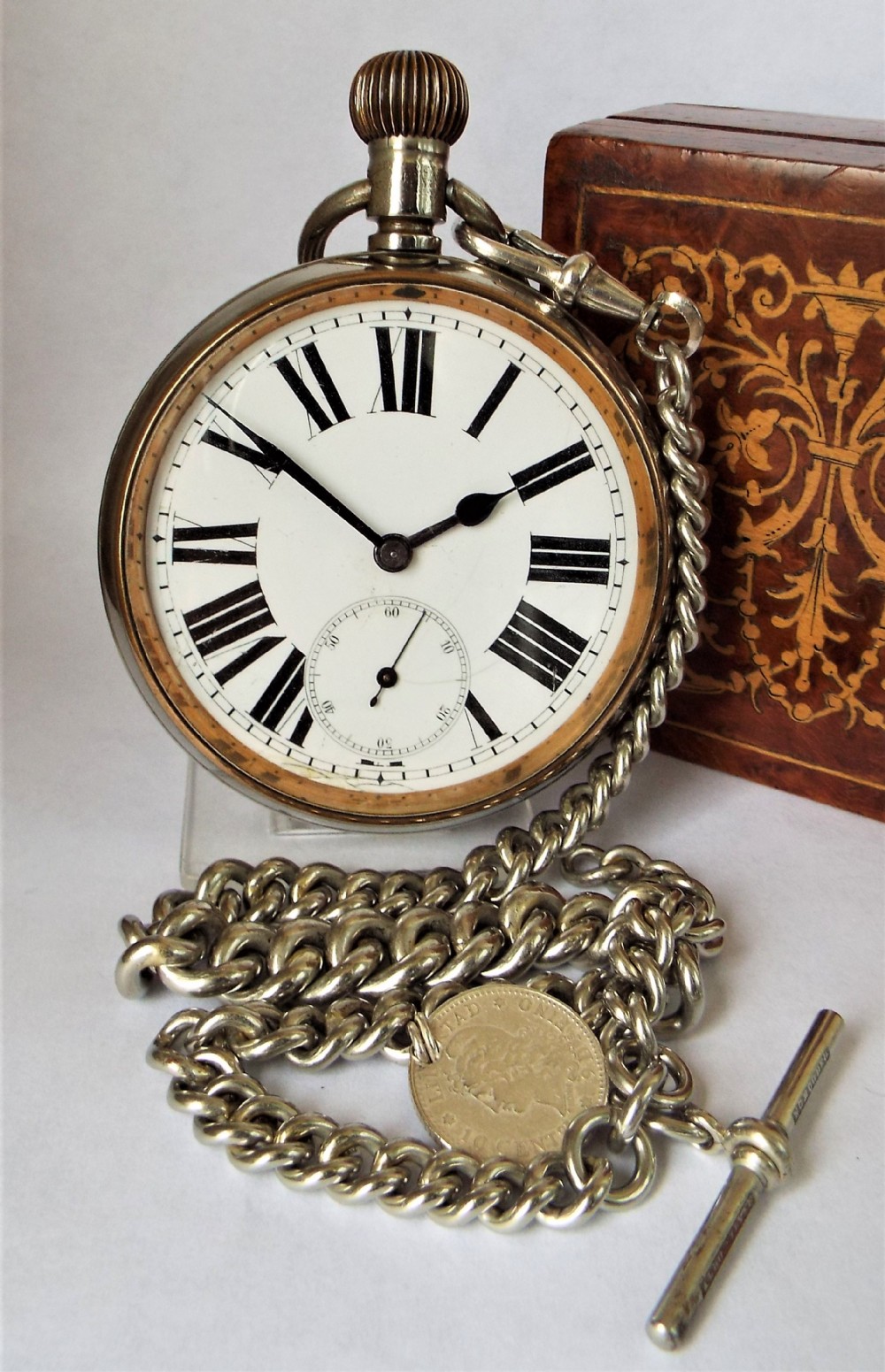 Antique Goliath pocket watch and chain, circa 1910s.