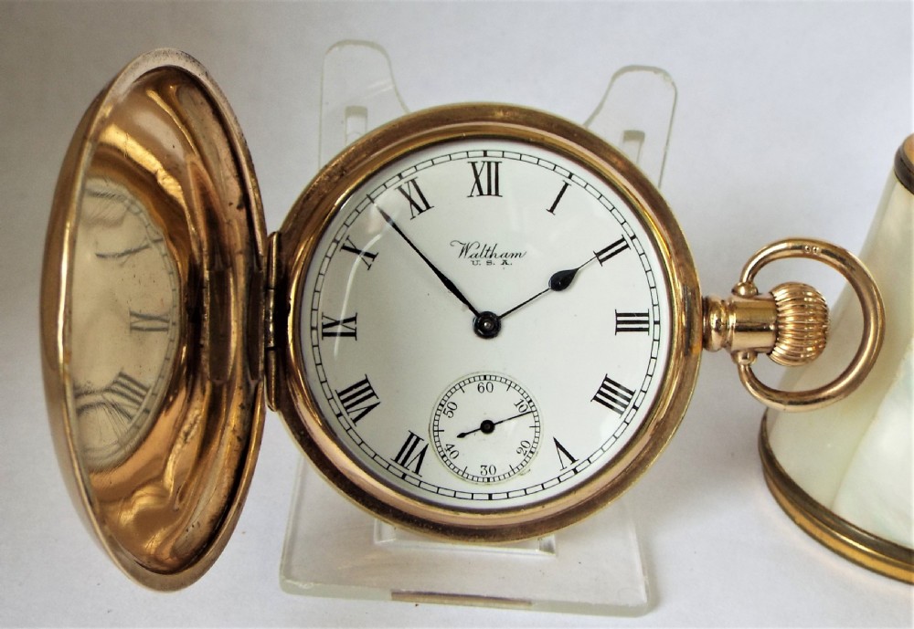 A 1927 Waltham Traveler full hunter pocket watch.