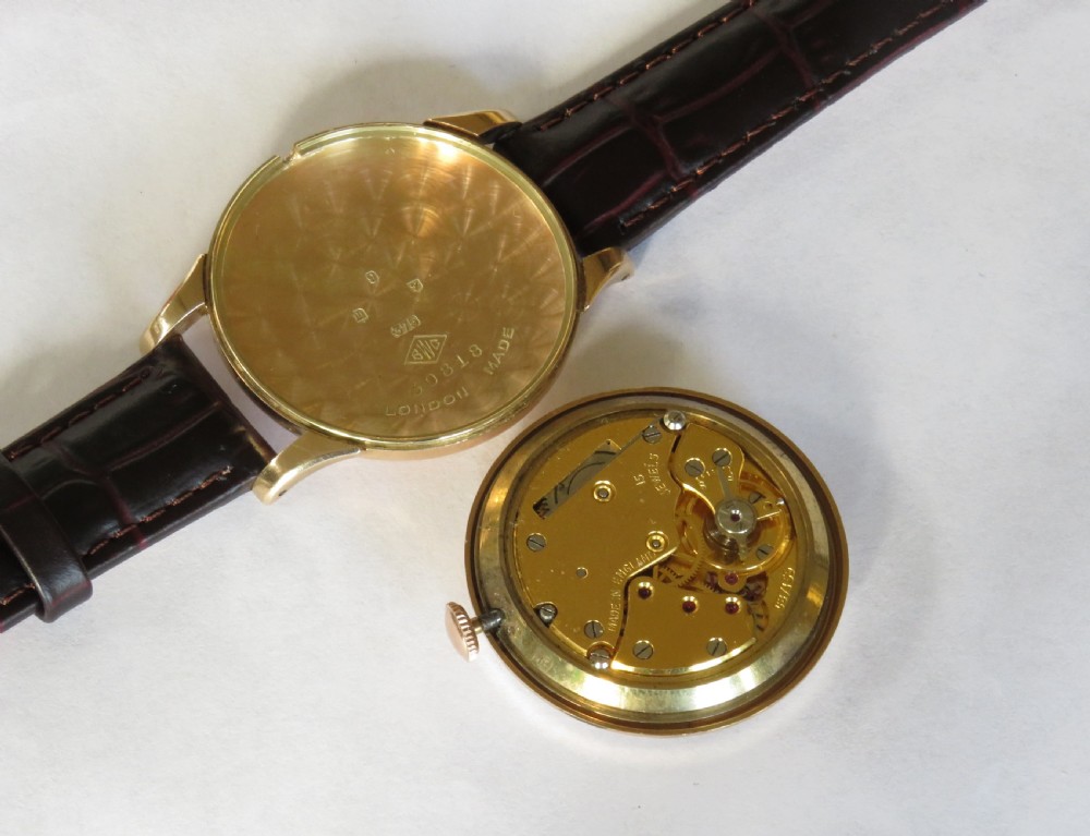 Good-sized 9ct gold Smiths De Luxe wrist watch, 1954 View V