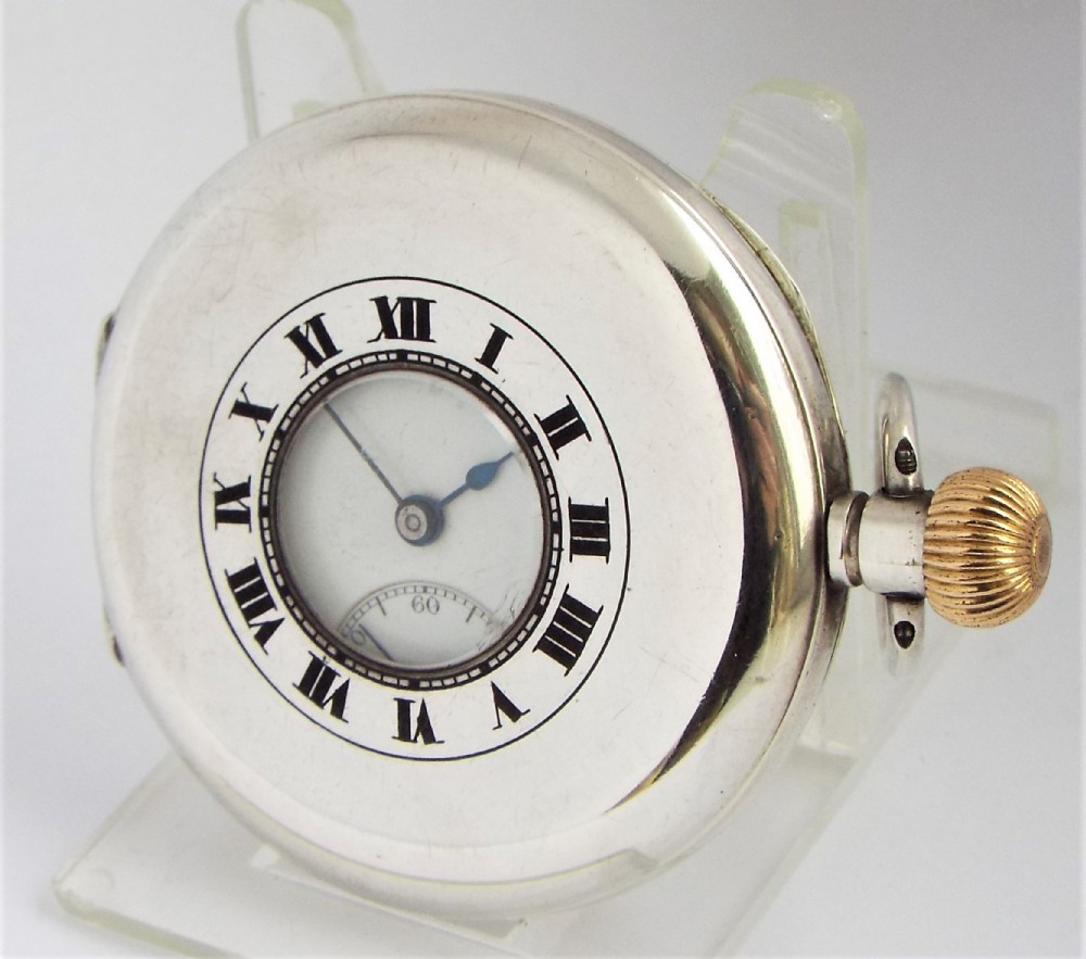 Antique silver Cyma half hunter pocket watch.
