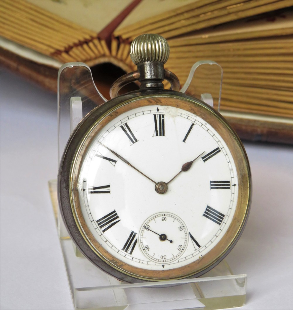 An antique gun metal Omega pocket watch. View II