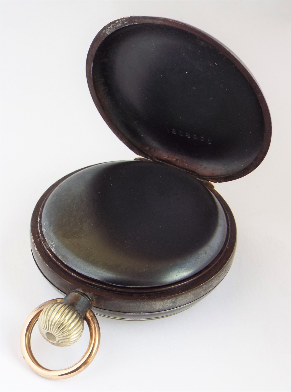 An antique gun metal Omega pocket watch. View III