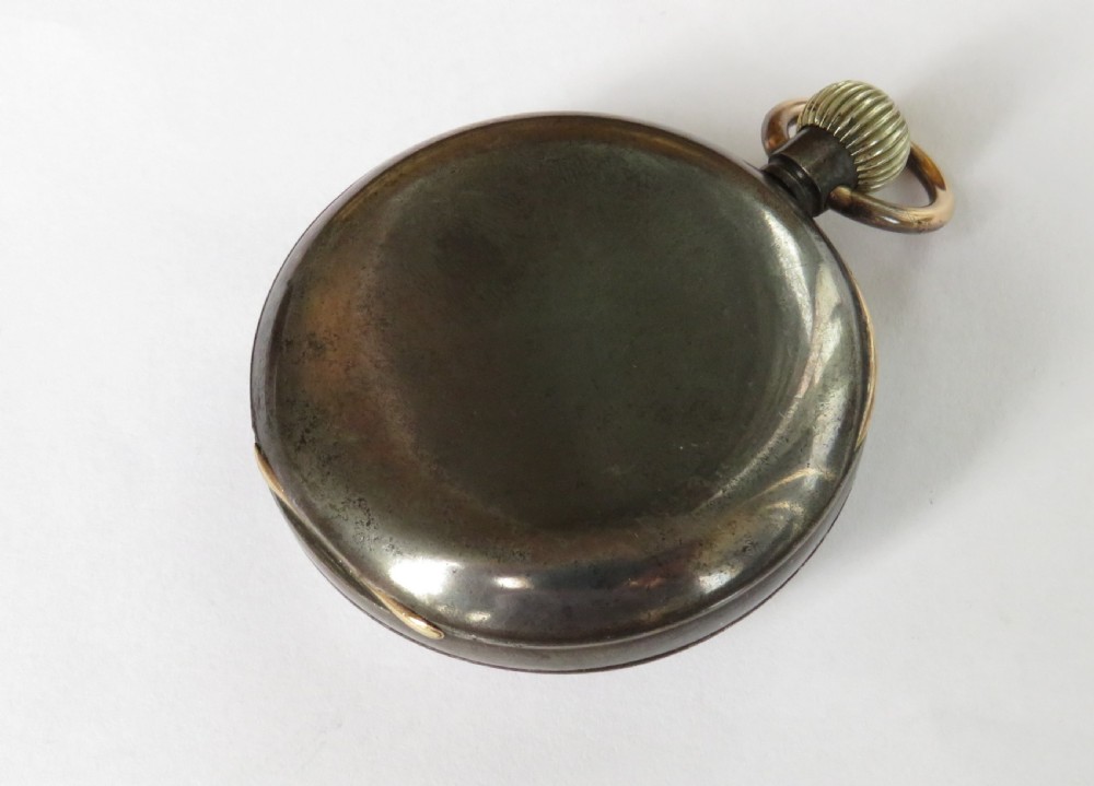 An antique gun metal Omega pocket watch. View VI