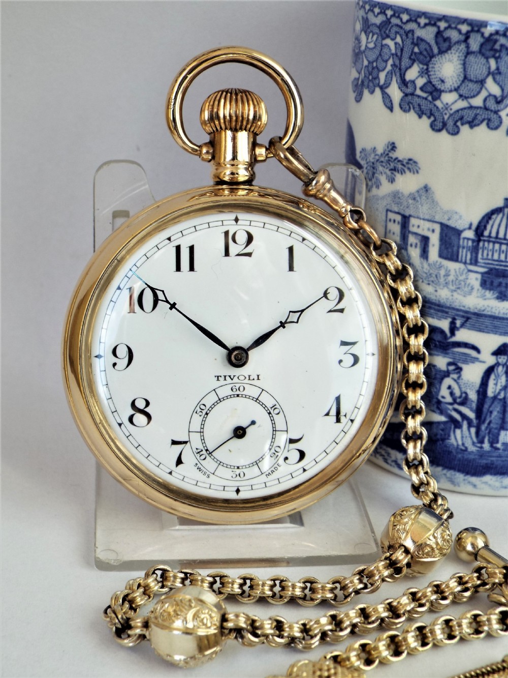 A 1930s Swiss Tivoli pocket watch and chain. View II