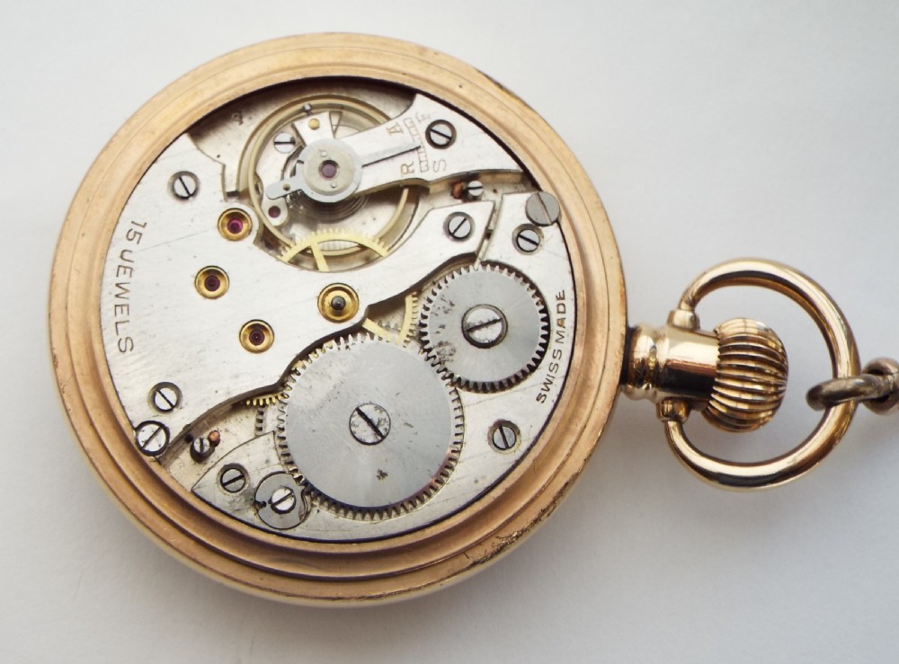 A 1930s Swiss Tivoli pocket watch and chain. View IV