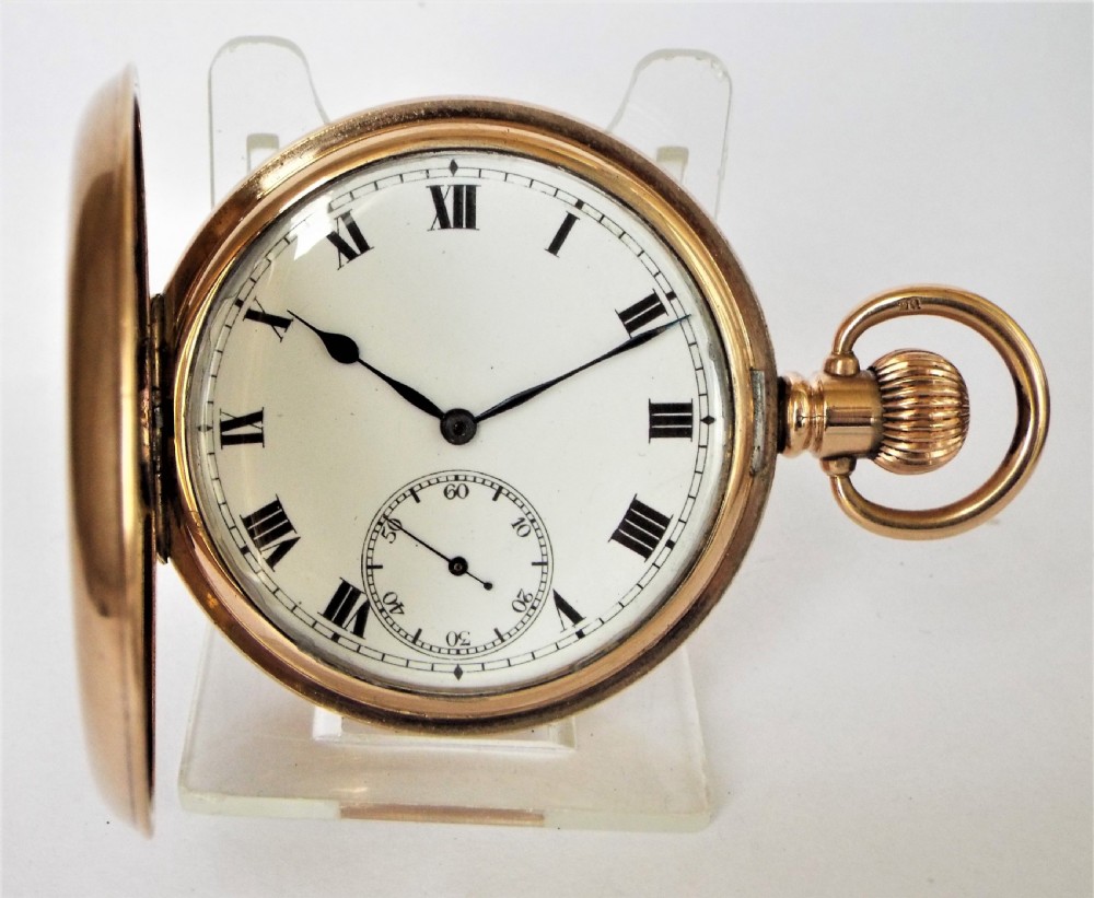 A 1920s Swiss full hunter pocket watch.