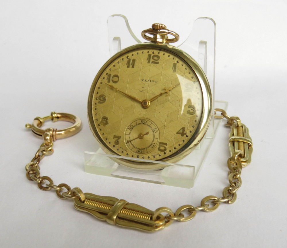A 1930s Tempo pocket watch & chain.