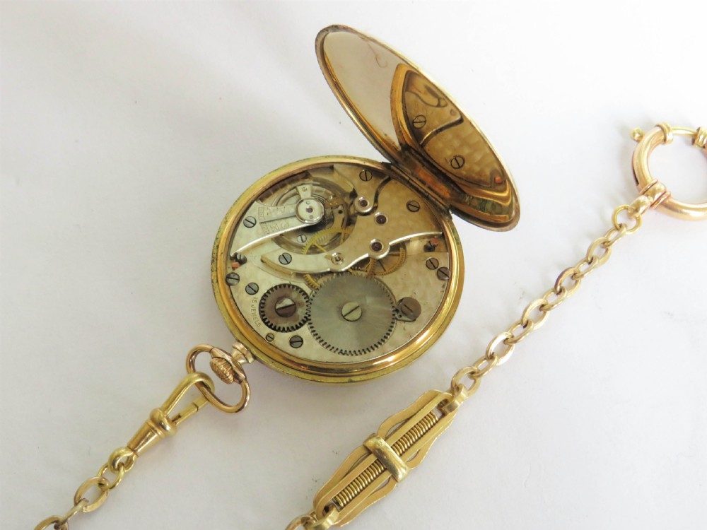 A 1930s Tempo pocket watch & chain. View III