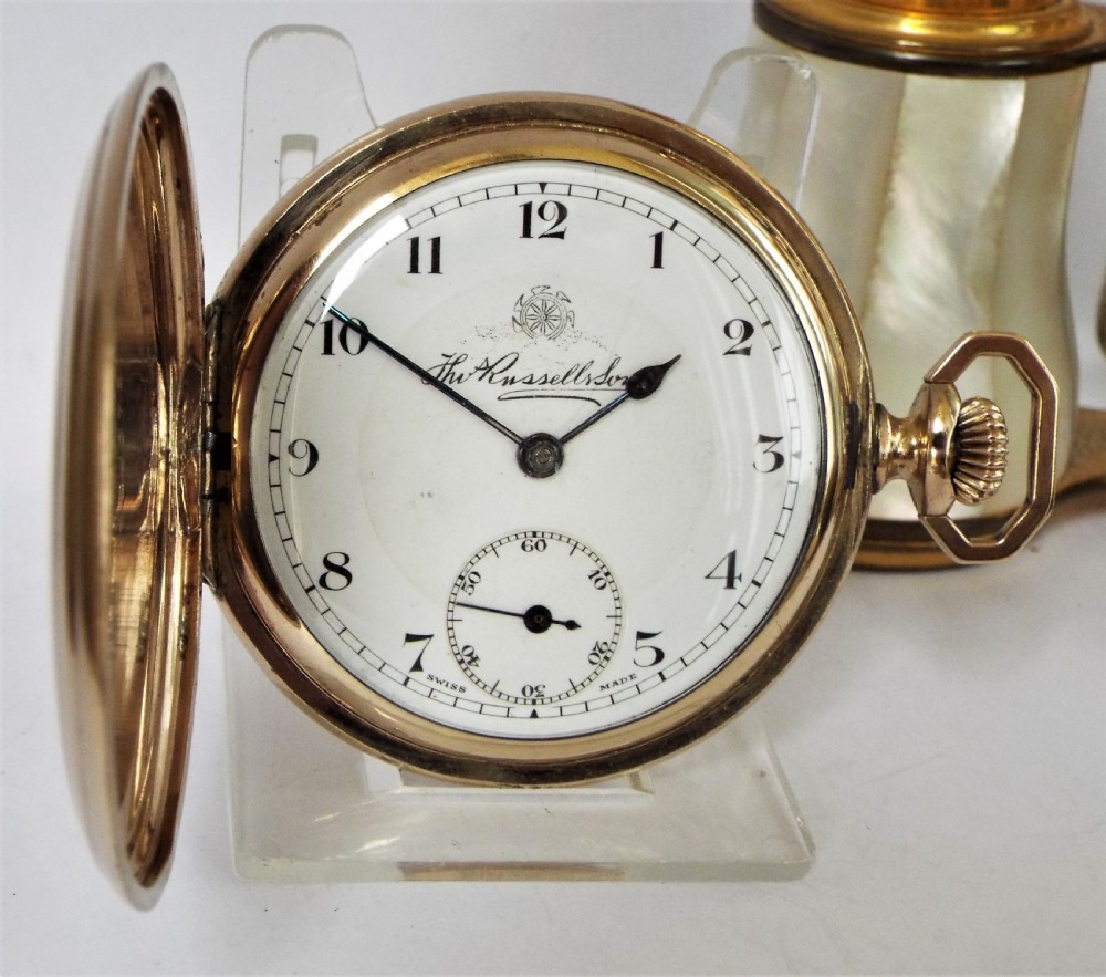 A 1930s Thomas Russell full hunter pocket watch.