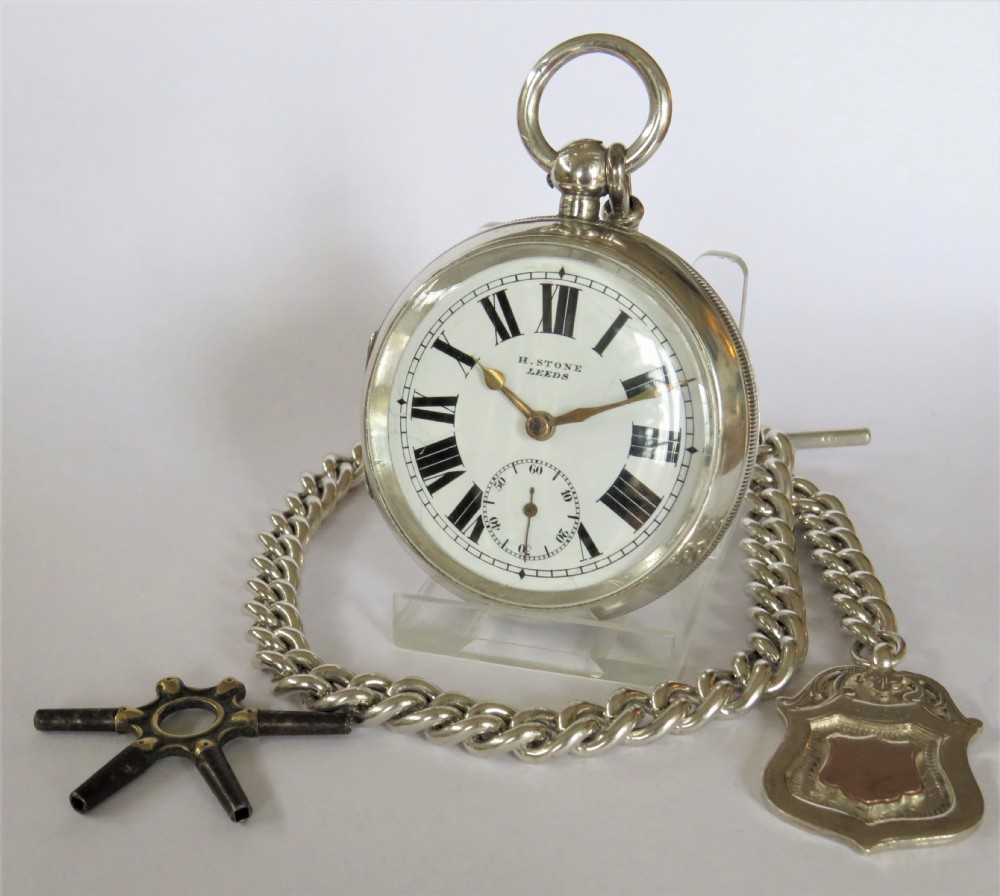 Large antique English silver pocket watch and albert.
