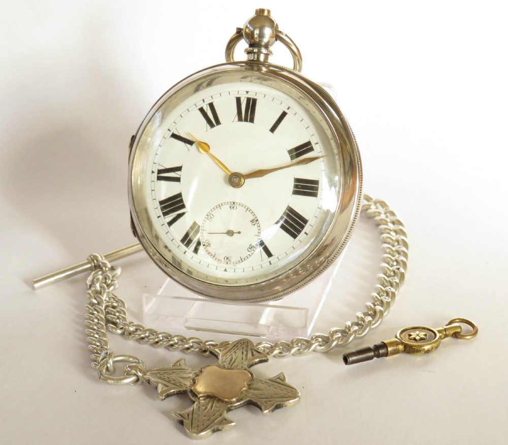 Large antique silver pocket watch, William Ehrhardt, with albert.