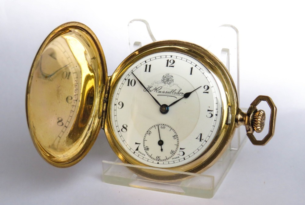 A 1930s Thomas Russell full hunter pocket watch.