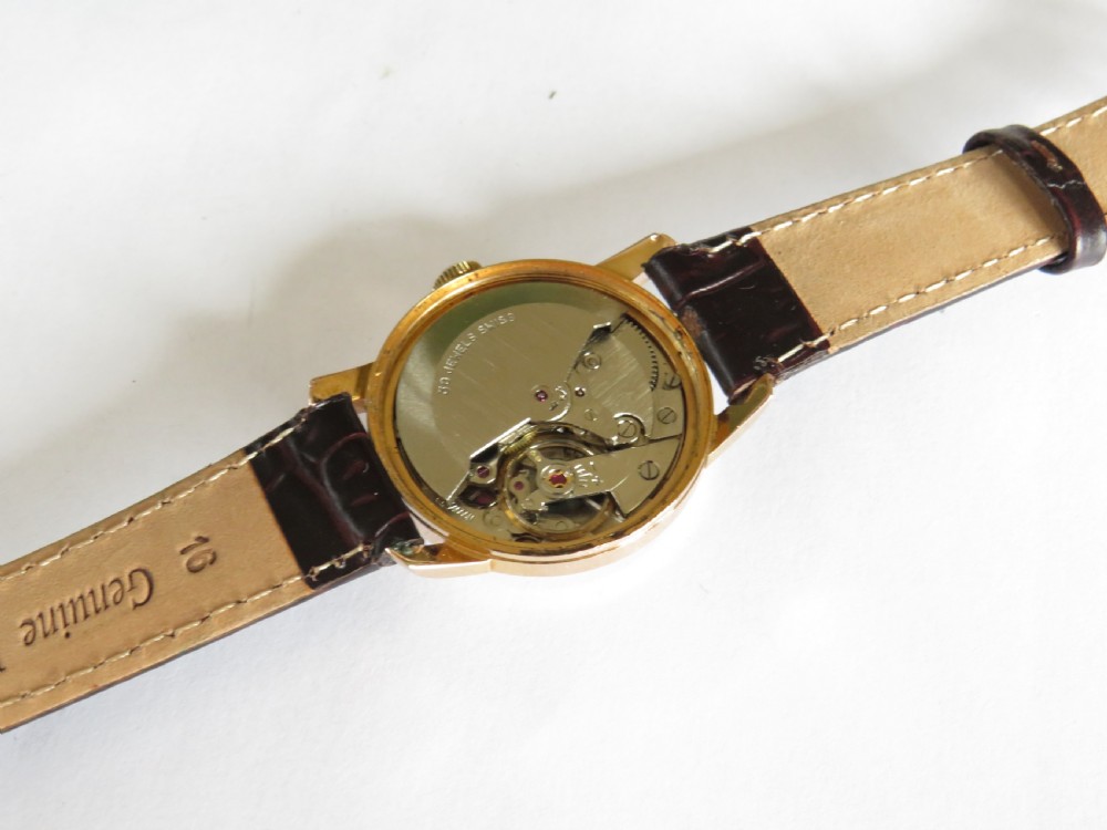 Mid-size 1950s MuDu Doublematic wrist watch View V