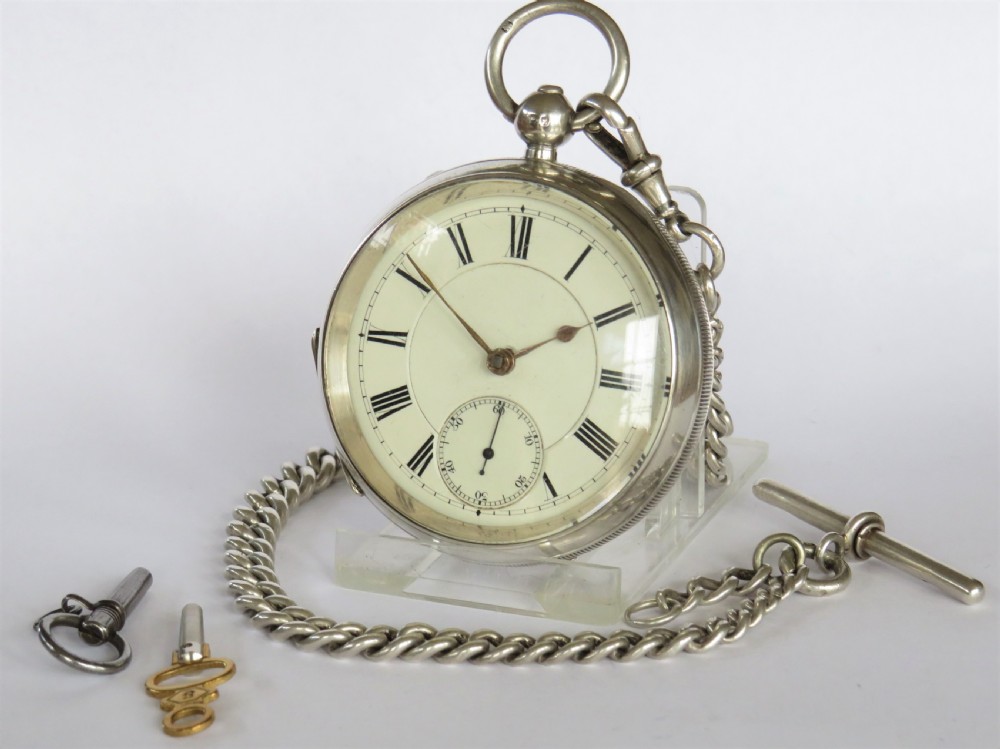 Antique silver Waltham pocket watch and albert