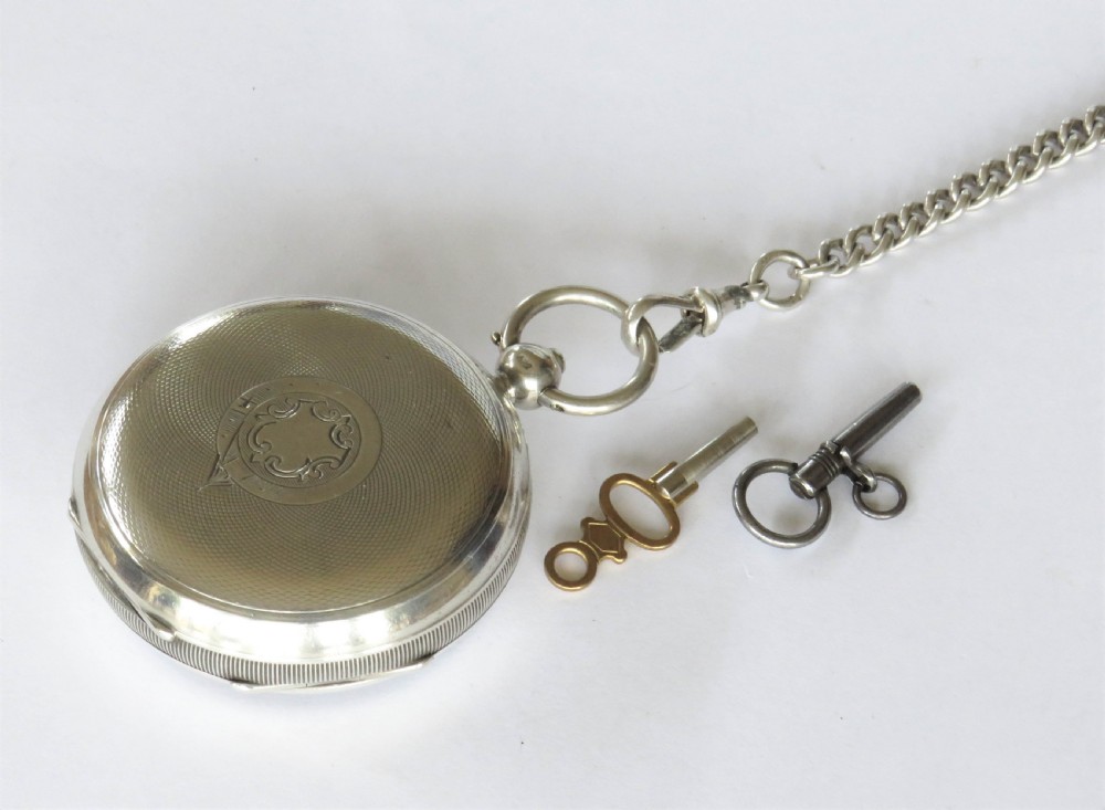 Antique silver Waltham pocket watch and albert View IV