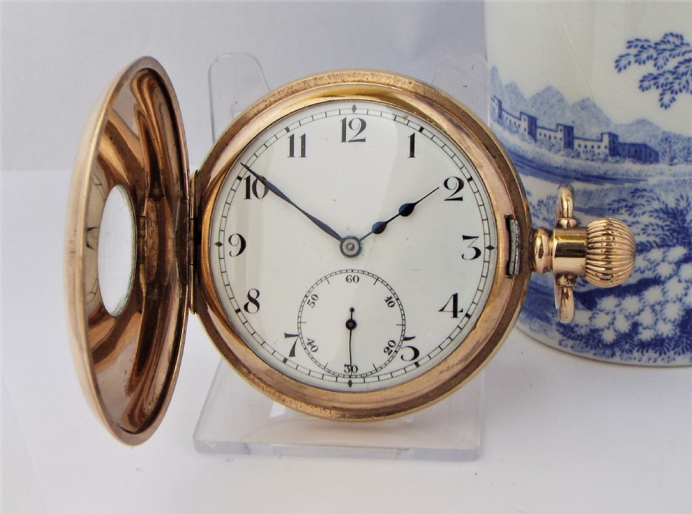 A vintage 1920s Swiss half hunter pocket watch. View II