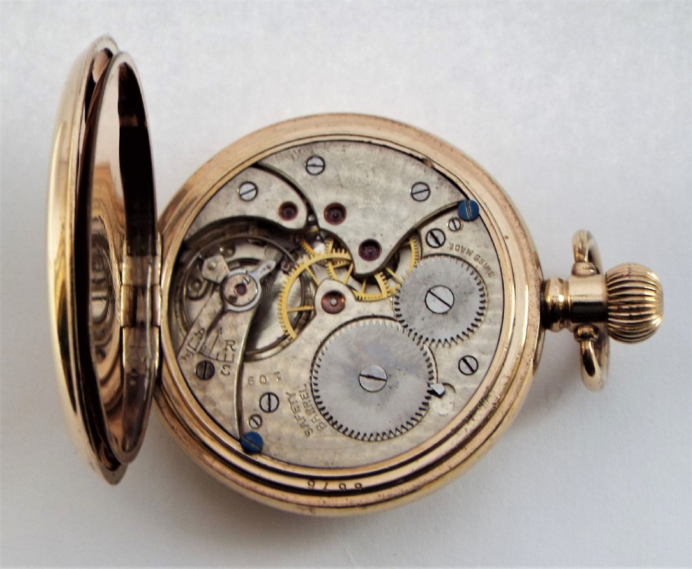 A vintage 1920s Swiss half hunter pocket watch. View IV