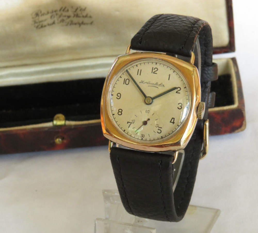 9ct gold cushion cased wristwatch from Ths Russell, 1944