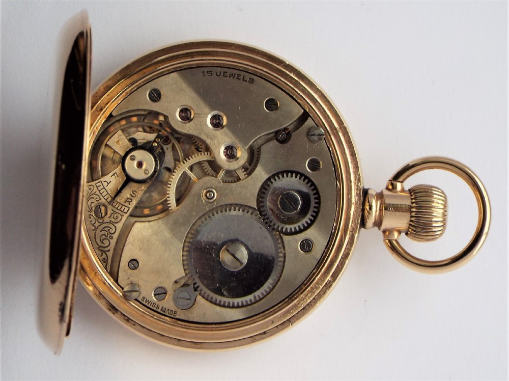 A vintage 1920s Swiss half hunter pocket watch. View V