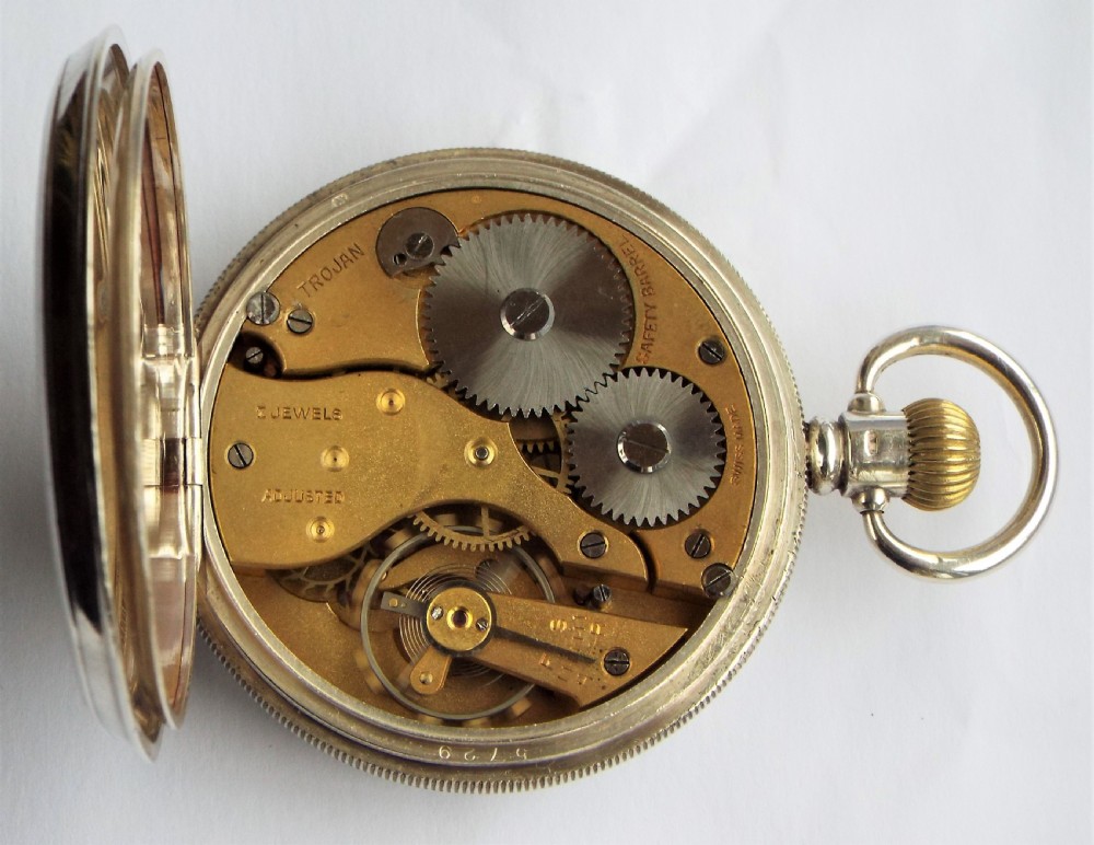 A 1920s silver Trojan pocket watch. View V