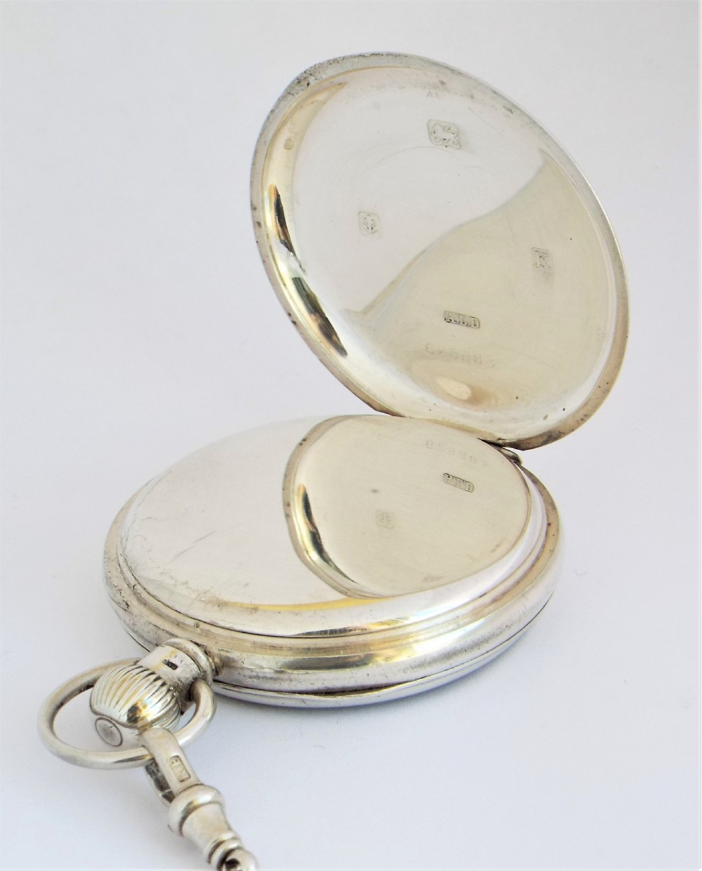 1934 silver Revue pocket watch for J W Benson. View VI