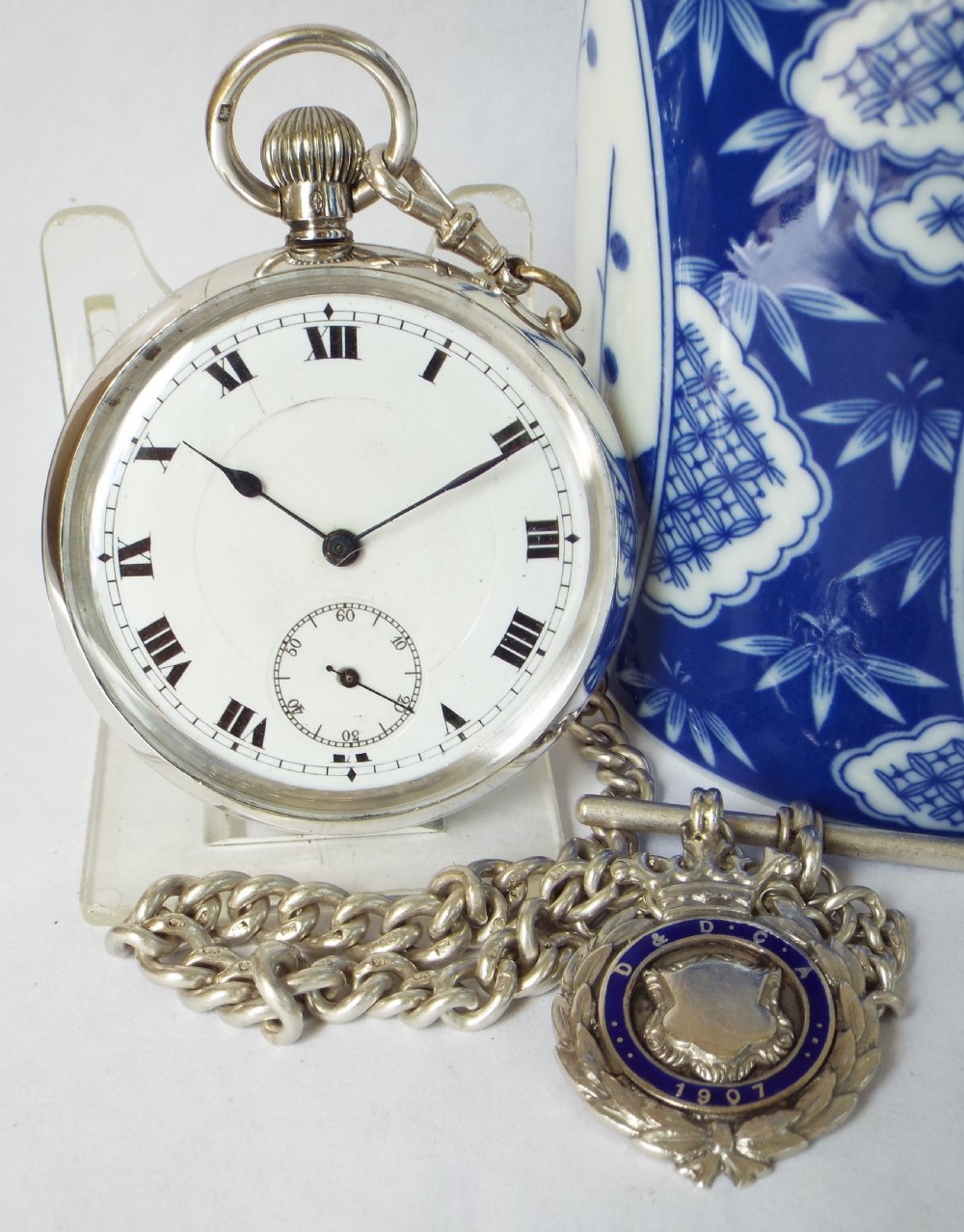 Antique silver pocket watch, 1919 & chain.
