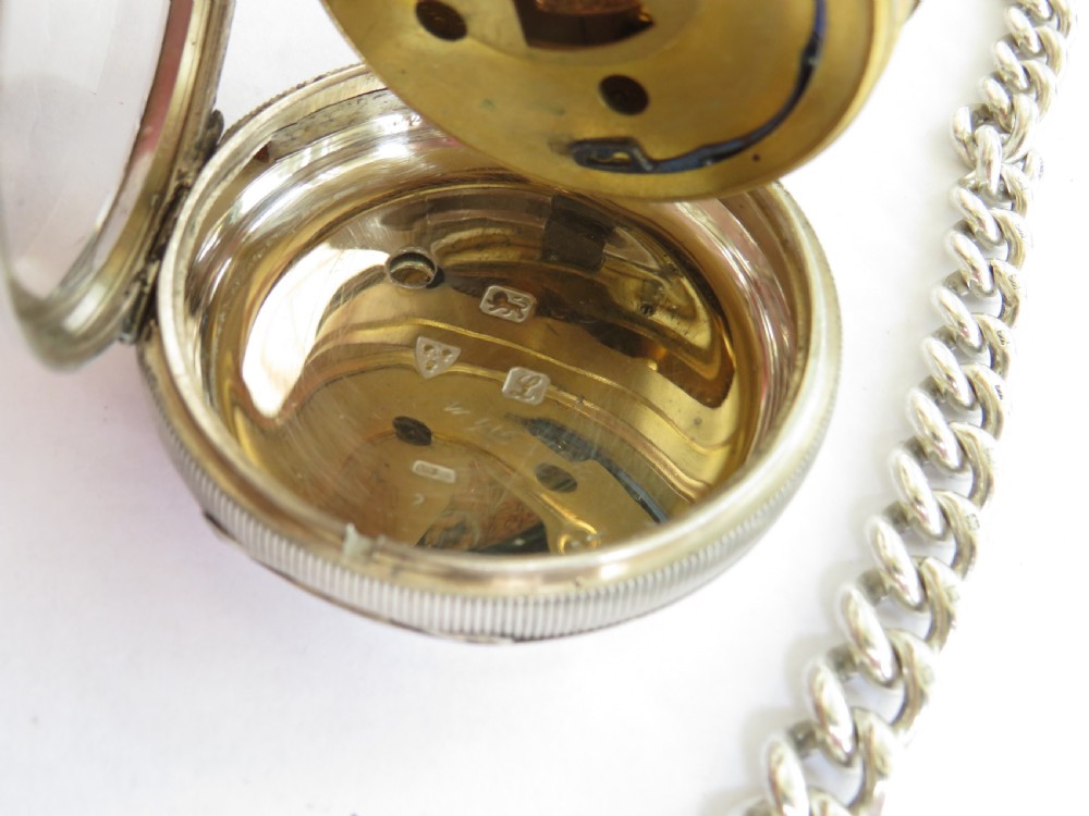 Antique silver Russells Ltd silver pocket watch and albert View V