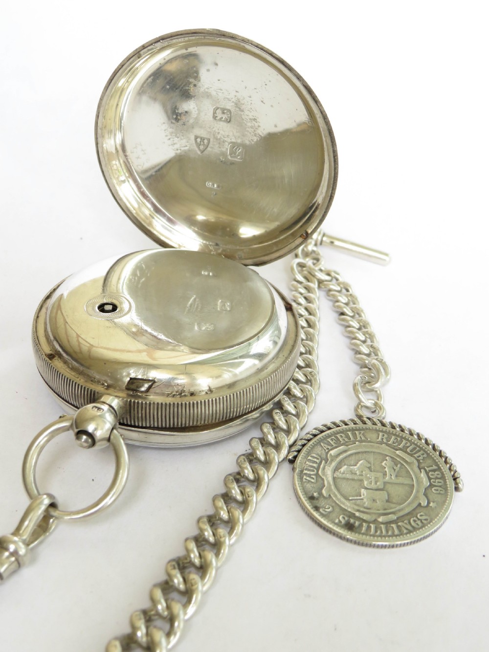 Antique silver Russells Ltd silver pocket watch and albert View VI