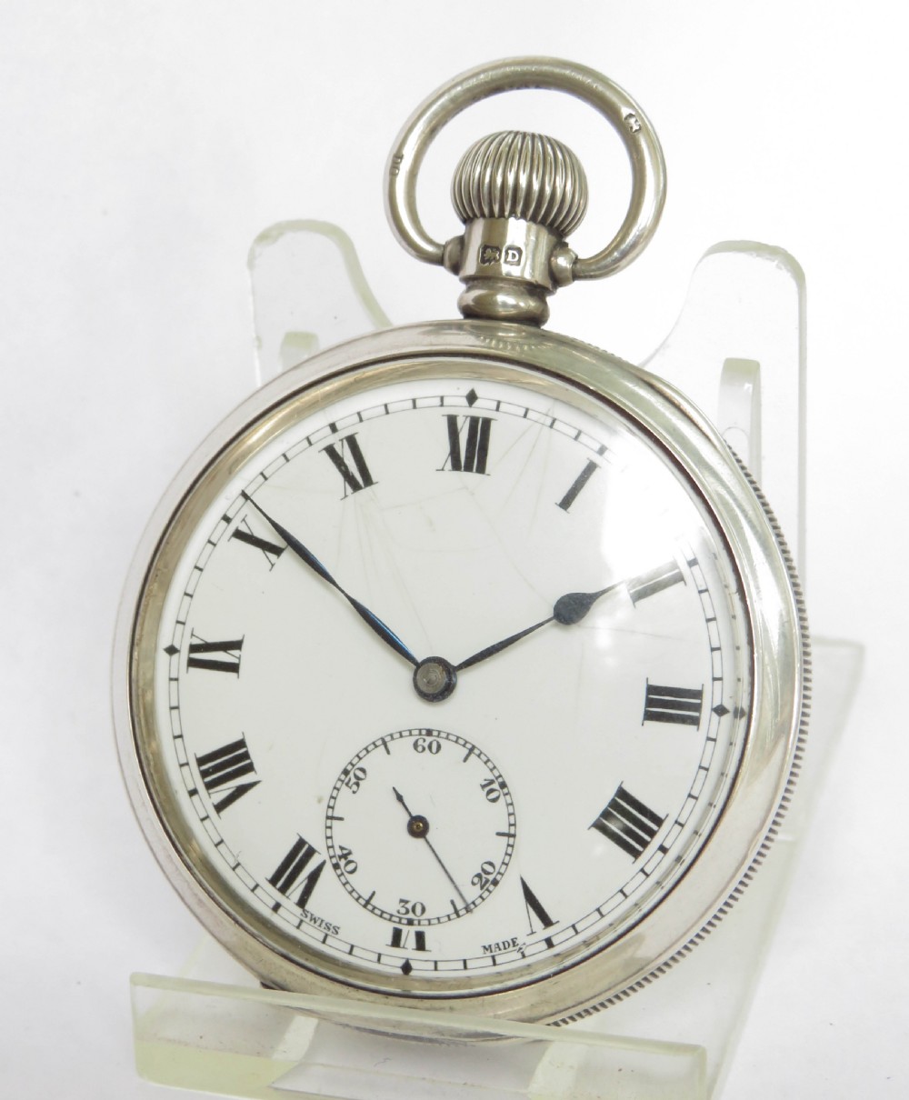 Antique silver pocket watch, 1928