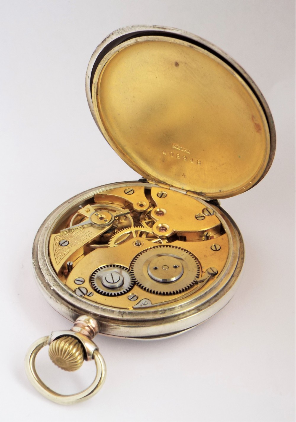 An antique galonne cased pocket watch, circa 1910s. View IV