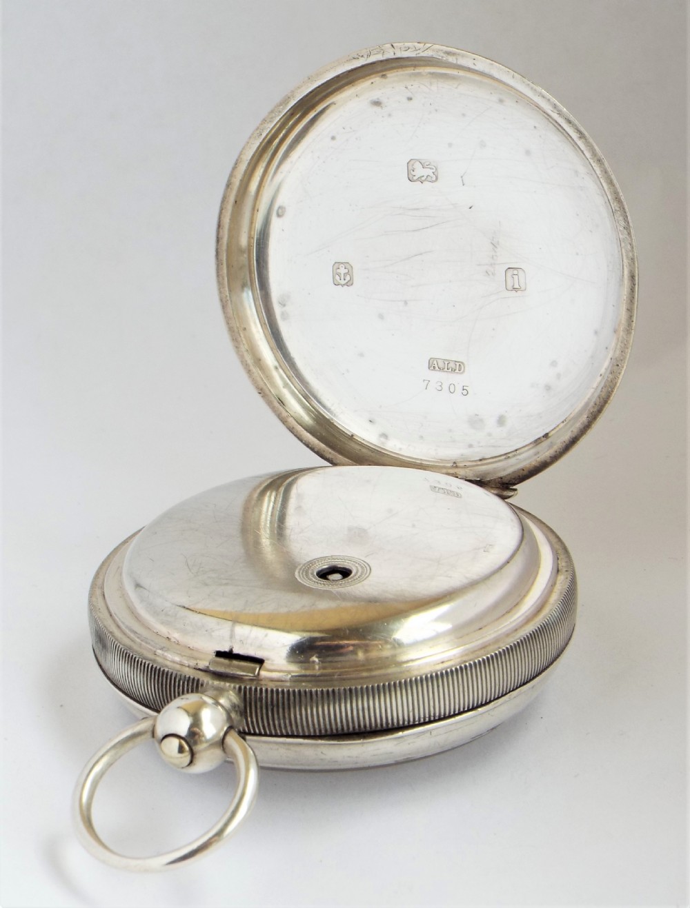 Large antique Victorian silver pocket watch from Fattorini & Sons of Bradford. View III