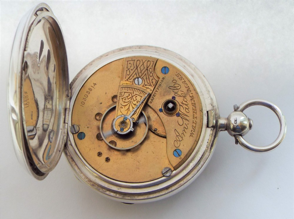 An antique silver Waltham pocket watch. View V
