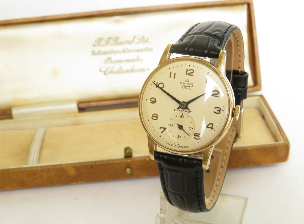 Gents 9ct gold Smiths De Luxe wrist watch, 1963