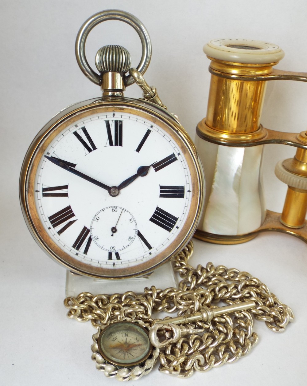 Antique Goliath pocket watch and chain, circa 1910s.