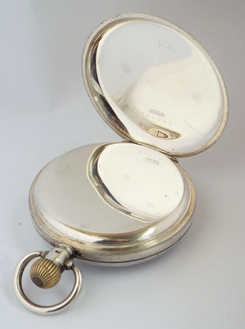 A 1920s silver Cyma pocket watch. View III