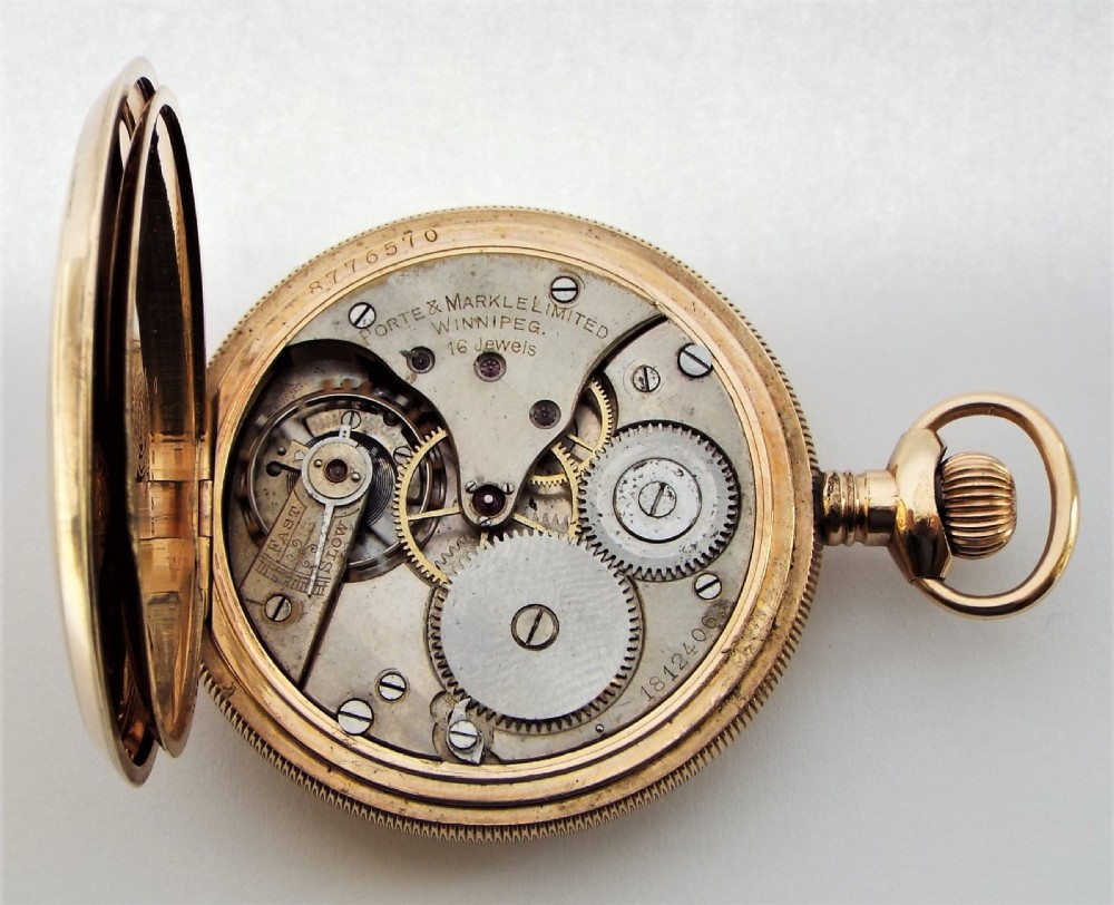 A 1920s Minerva full hunter pocket watch originally retailed by Porte & Markle Winnipeg. View VI