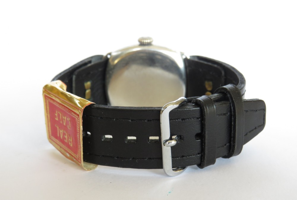 Gents silver cushion cased wrist watch, 1927 View V