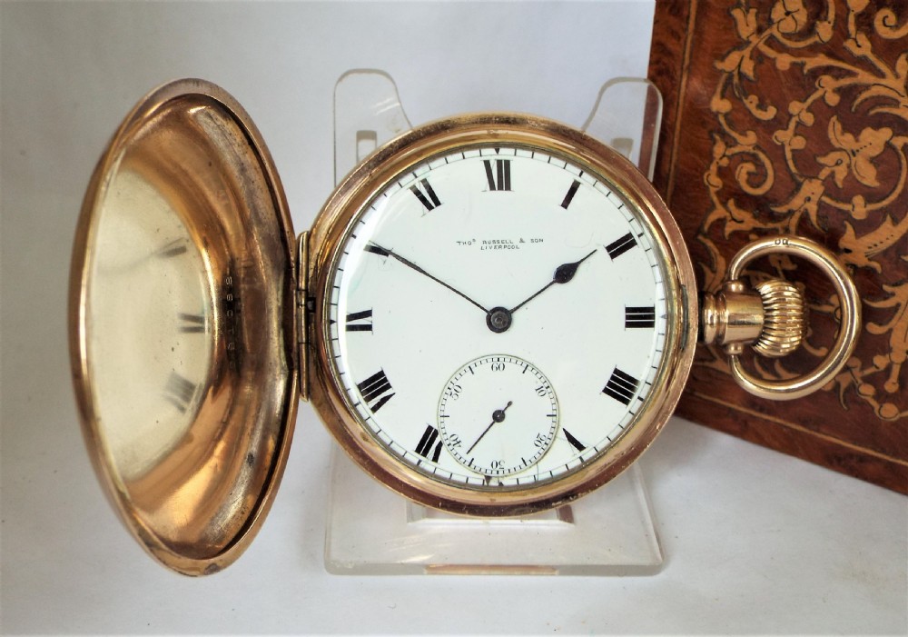 A 1920s Thomas Russell full hunter pocket watch.